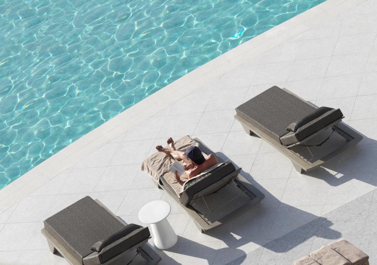 Nautilux Rethymno By Mage Hotels エクステリア 写真 A man sunbathing
