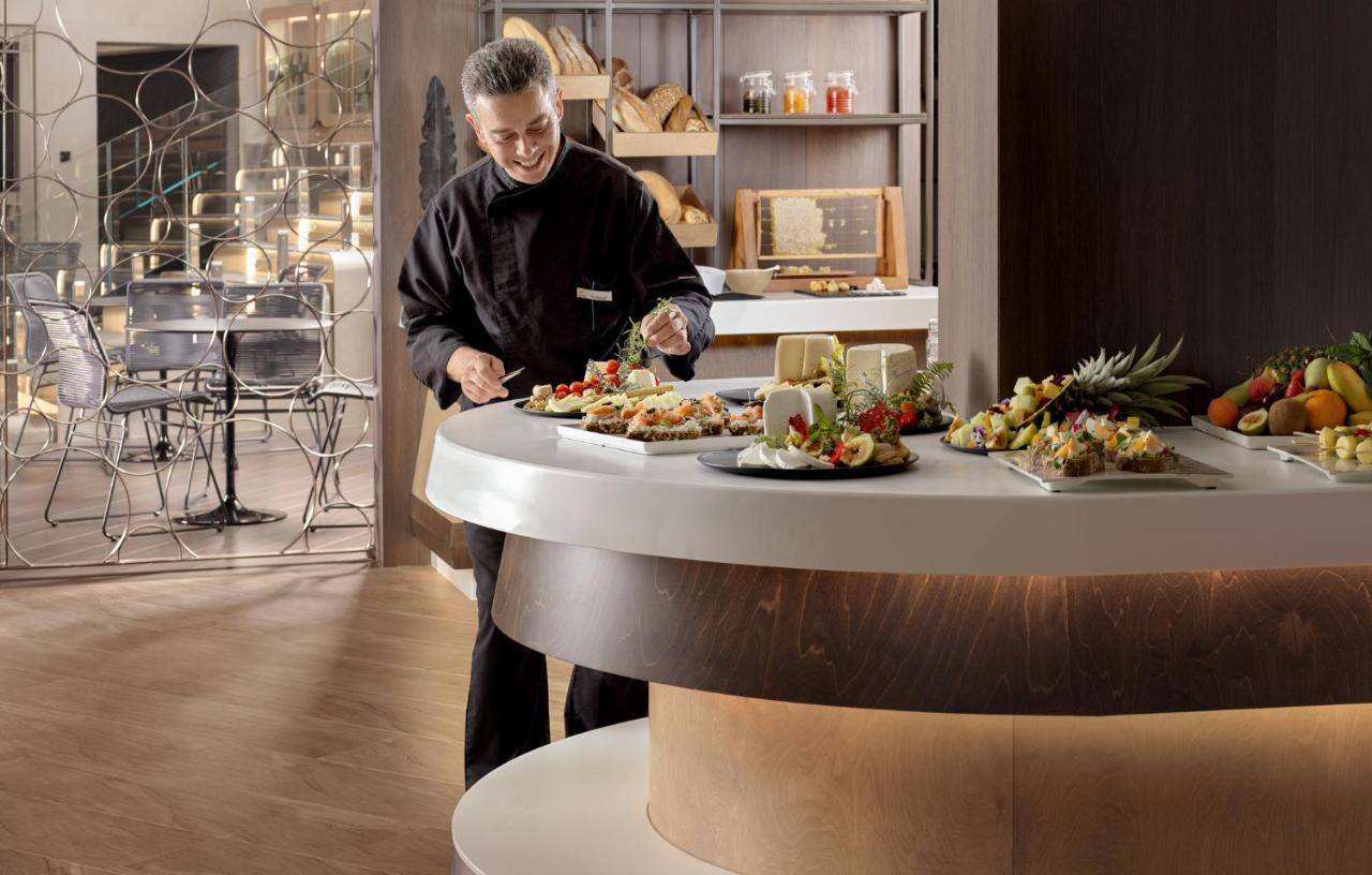Nautilux Rethymno By Mage Hotels エクステリア 写真 A chef at work